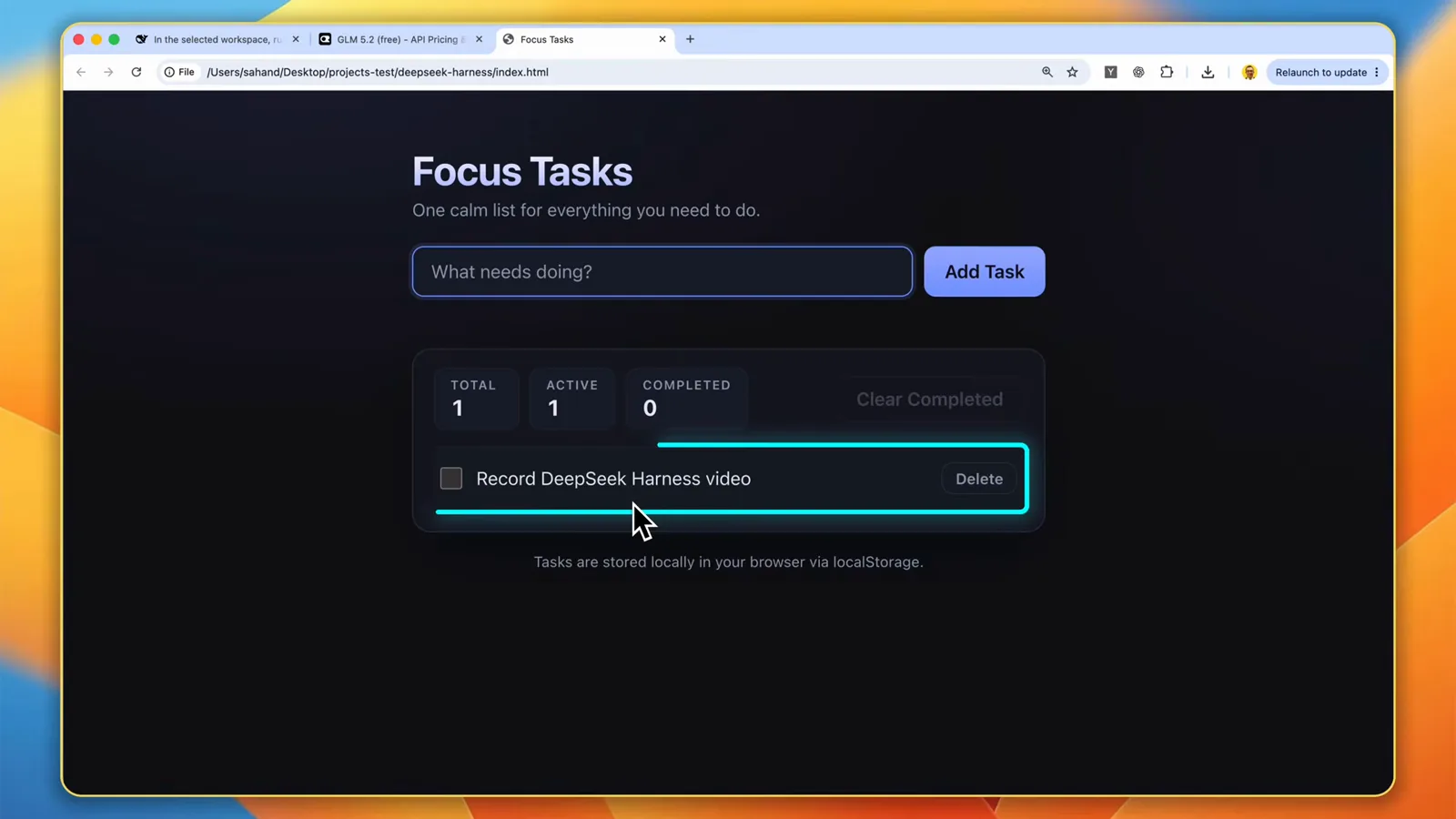 Focus Tasks single-file task manager built by DeepSeek Harness with TOTAL 1, ACTIVE 1 and COMPLETED 0 counters and a Record DeepSeek Harness video task stored via localStorage
